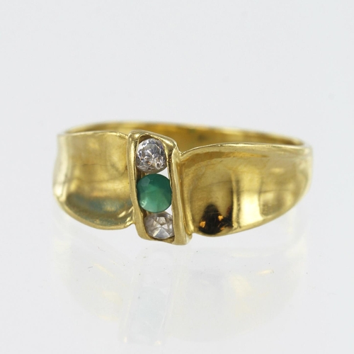 582 - Yellow gold (tests 18ct) CZ ring, finger size O, weight 3.2g.