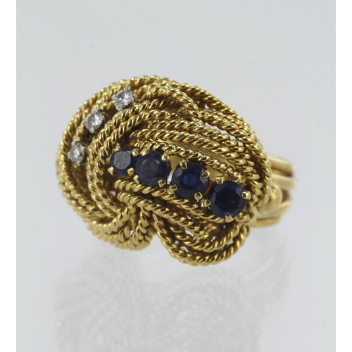 583 - 18ct yellow gold diamond and sapphire knot ring, three round brilliant cut diamonds TDW approx. 0.06... 