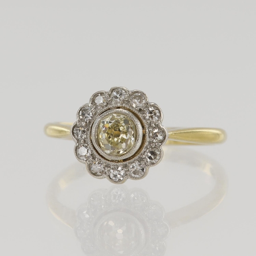 587 - Yellow gold (tests 18ct) vintage diamond daisy cluster ring, principle old cut diamond approx. 0.40c... 