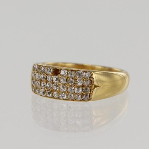 590 - Yellow gold (tests 18ct) diamond pave set ring, four rows of old cut diamonds, one diamond missing, ... 