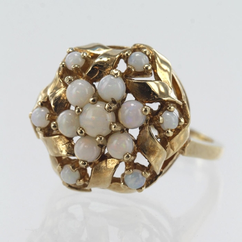 592 - Yellow gold (tests 9ct) opal cluster ring, thirteen cabochon opals, principle measures 3.5mm, head d... 