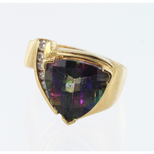 594 - Yellow gold (tests 14ct) diamond and mystic topaz contemporary dress ring, one checker trillion shap... 