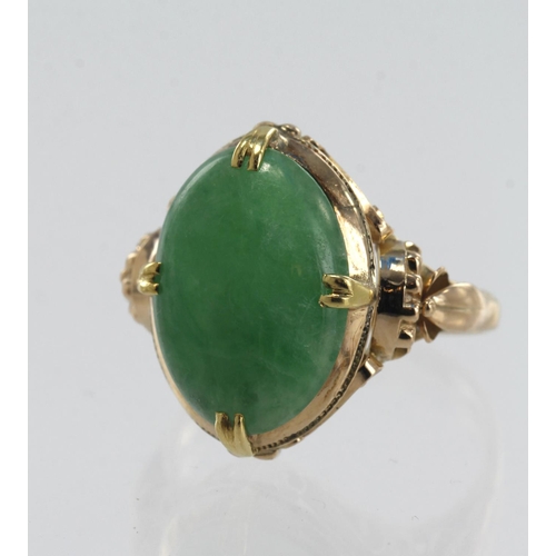 604 - Yellow gold (tests 14ct) jade cocktail ring, cabochon cut jadeite jade measures 15mm x 11mm, double ... 