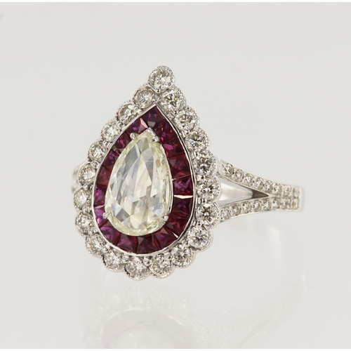 614 - White gold (tests 18ct) diamond and ruby double halo cluster ring, principle pear shaped rose cut di... 