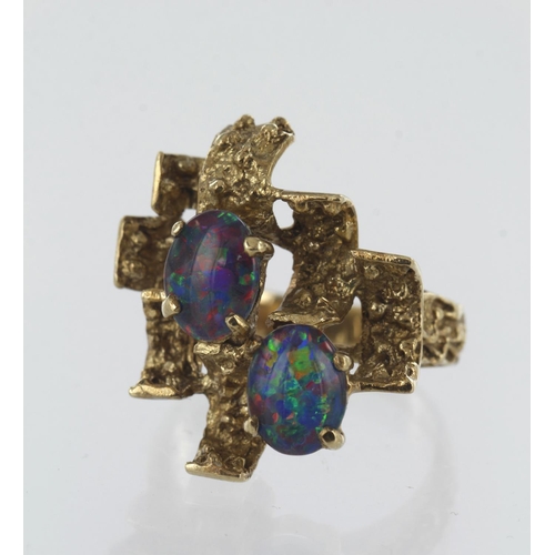 621 - Yellow gold (tests 9ct) brutalist black opal triplet ring, two black opal triplets measuring approx.... 