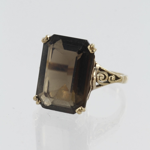 623 - Yellow gold (tests 9ct) smoky quartz cocktail ring, quartz measures 18mm x 13mm, finger size R, weig... 