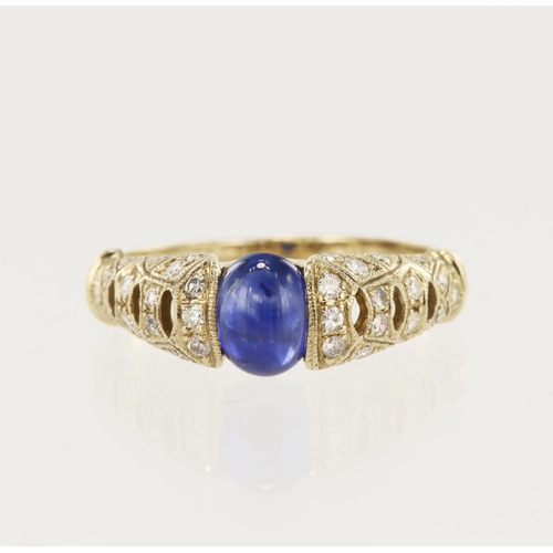 631 - Yellow gold (tests 18ct) diamond and sapphire dress ring, oval cabochon sapphire approx. 1ct, open w... 