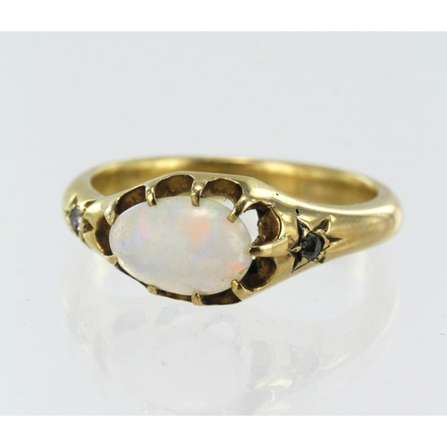 637 - Yellow gold (tests 14ct) vintage diamond and opal ring, cabochon measures approx. 9.8mm x 6.5mm, sca... 