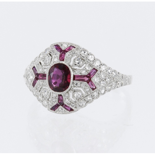 656 - White metal tests platinum ruby and diamond art deco style cluster ring, principle oval mix cut ruby... 