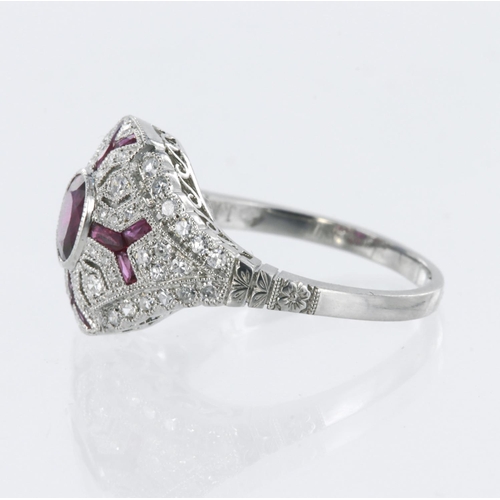 656 - White metal tests platinum ruby and diamond art deco style cluster ring, principle oval mix cut ruby... 