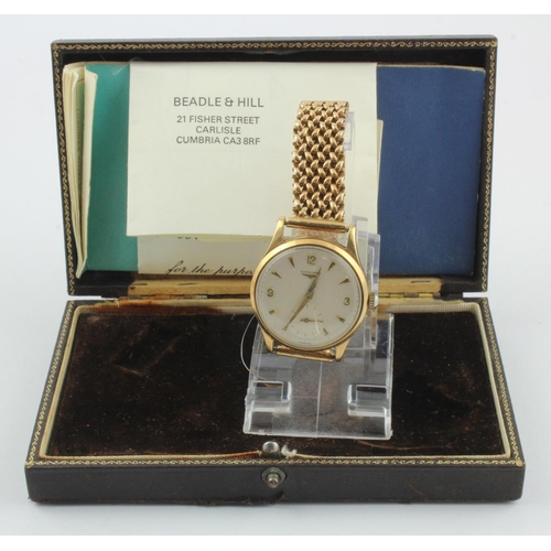 74 - Gents 9ct gold cased Longines manual wind wristwatch, circa 1959. The champagne dial with Arabic num... 