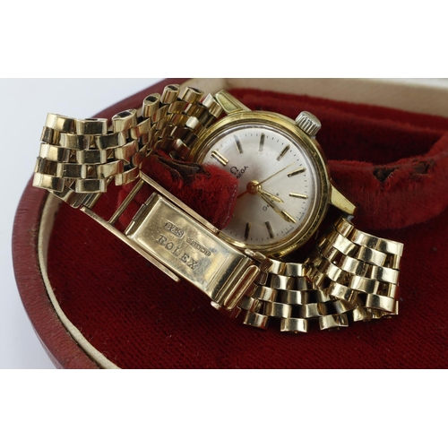 80 - Ladies gold plated Omega Geneve manual wind wristwatch. The  silver dial with black baton markers an... 