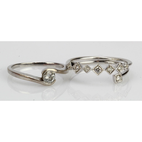 809 - Two 18ct white gold/tests 18ct diamond rings, contemporary solitaire approx. 0.245ct, finger size K.... 