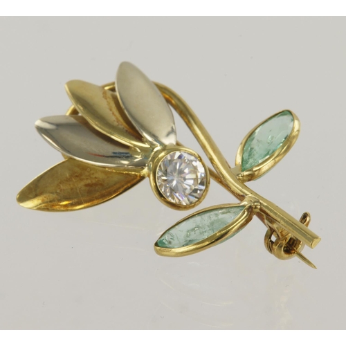 817 - Yellow gold (tests 18ct) floral brooch, set with one round CZ and two marquise cut emeralds, alterna... 