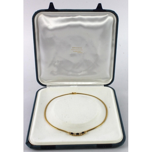 926 - 18ct yellow gold diamond and sapphire necklet, three graduating oval sapphires, sixteen round brilli... 