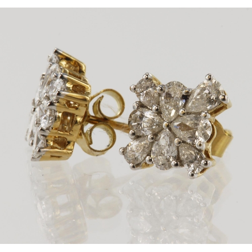 927 - Pair of 18ct yellow gold diamond cluster stud earrings, set with eight pear cut diamonds in each stu... 