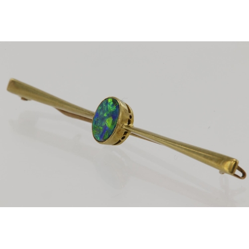 933 - Yellow gold (tests 15ct) vintage black opal doublet bar brooch, opal measures approx. 8mm x 5.5mm, b... 