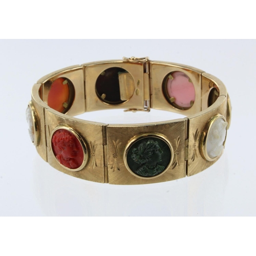 936 - Yellow gold (tests 14ct) carved cameo linked cuff bracelet, eight carvings each depicting a lady in ... 