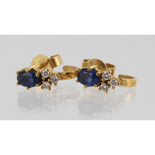 953 - Pair of 18ct yellow gold diamond and sapphire stud earrings, one oval sapphire approx. 5.5mm x 4mm, ... 