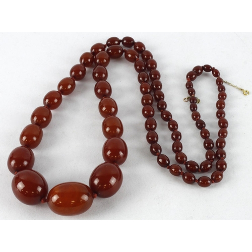 963 - Cherry red bakelite single row beaded necklace, sixty-nine graduating beads, largest bead approx. 31... 