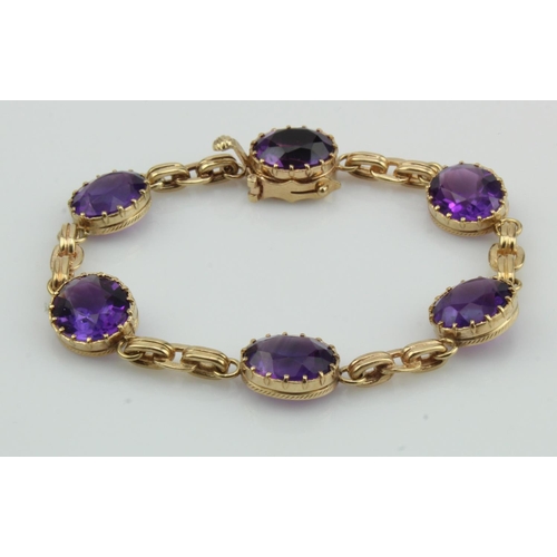 982 - 9ct yellow gold amethyst bracelet, six deep purple amethyst approx. 12mm x 10mm each, amethyst set b... 