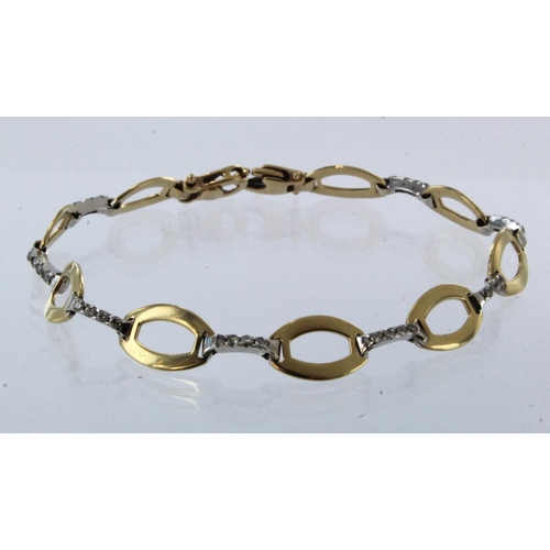 994 - 9ct yellow and white gold CZ set fancy linked bracelet, length 7