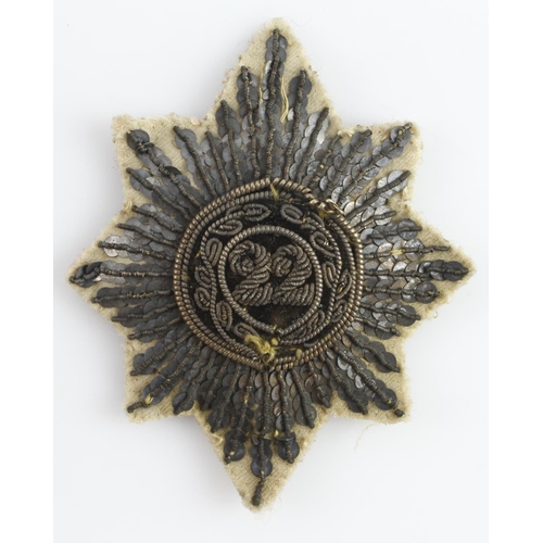 1002 - Cheshire Regt bullion star shaped cloth badge '22'. Victorian ?  (7cm)