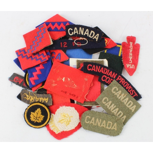 1028 - Cloth Badges: Canadian Army WW2 Formation Sign and Shoulder Title Badges all in excellent condition.... 