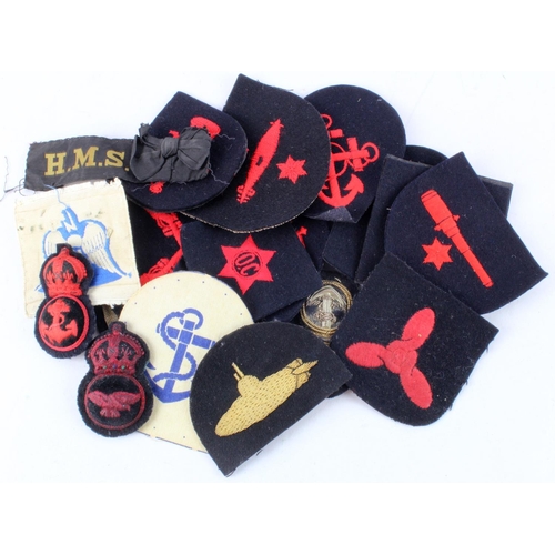 1030 - Cloth Badges: Royal Navy WW2 Cap and arm badges all in excellent condition. (approx 21)