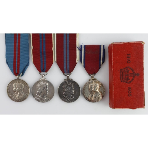 1038 - Coronation Medal 1911, 1953 x2, and Jubilee Medal 1935, all unnamed as issued  (4)