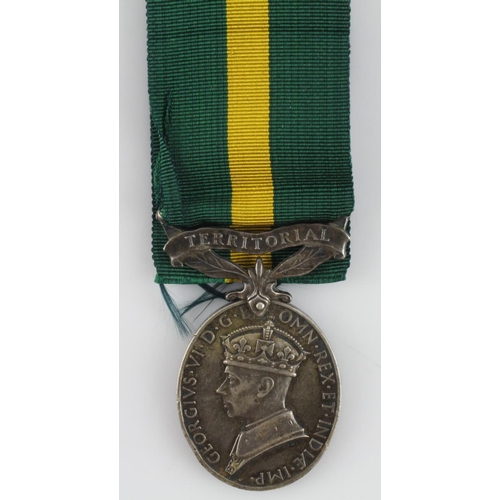 1071 - Efficiency Medal GVI with Territorial Clasp (7-37227 Sgt. H. Coobe R.A.S.C.,) damage to rim but deta... 