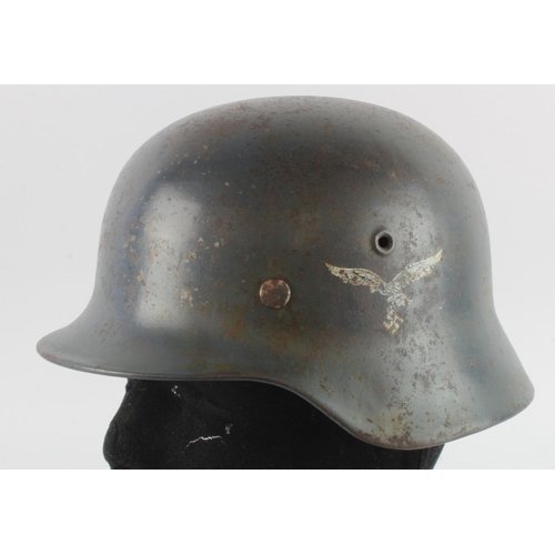 1132 - German 3rd Reich Luftewaffe double decal helmet with liner. Faintly stamped '876' ? Inside rim