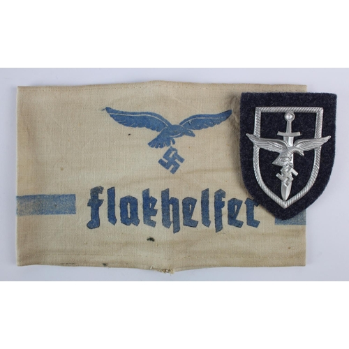 1168 - German female Flak helpers badge and armband.