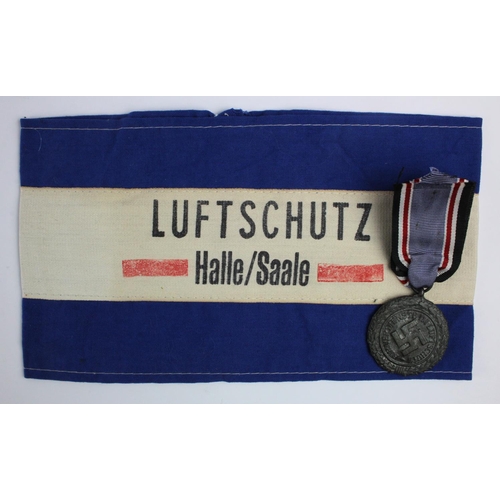 1202 - German Luftshutz armband and medal.