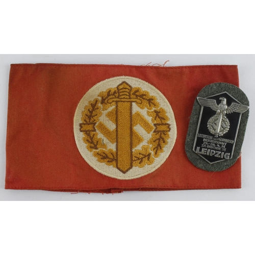 1242 - German SA armband and pin on badge.