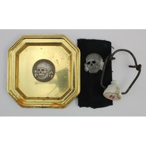 1248 - German SS ashtray, bottle top and a Deaths Head skull by repute Dutch SS 3x.