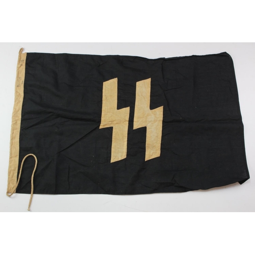 1255 - German SS Flag, 3 feet long, Berlin 1939 and RZM / SS stamped, service wear.