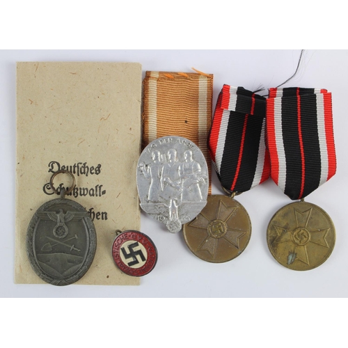 1273 - German War Merit medals 2x, a West Wall medal and NSDAP Party badge, pin A/F etc.