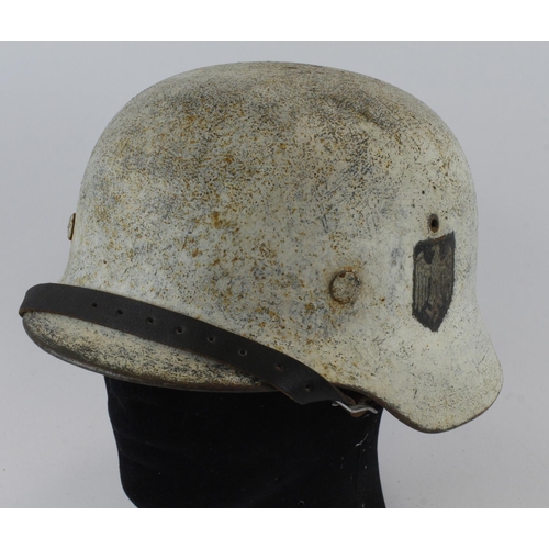 1306 - German WW2 single decal army helmet with snow camo.