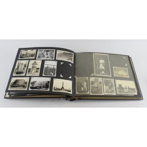 1456 - Photo album taken in Germany at the end of WW2 with various scenic photos and Military photos includ... 