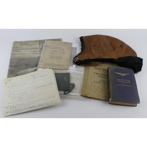 1530 - RNAS group with leather flying helmet, 1918 aviation pocket book, WW1 technical notes on aircraft, R... 