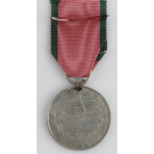 1594 - Turkish Crimea Medal 1855 'La Crimea' and named (4175 W H Hall 56th Regt). West Essex Regt of Foot