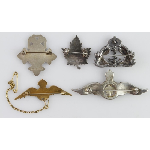 1644 - World War II brooches plus others: A good grouping which includes a 9ct gold and enamel RAF brooch o... 