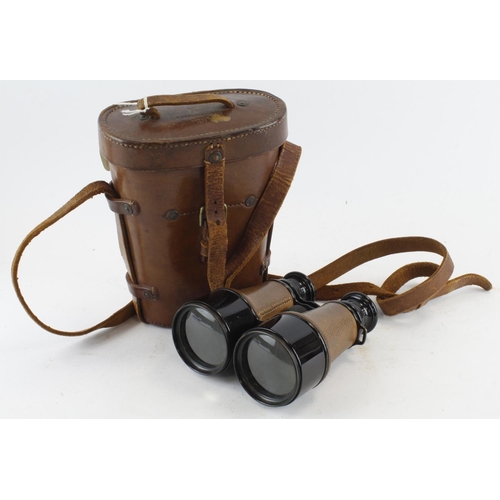 1715 - WW1 pair of binoculars in their 1918 dated leather case.