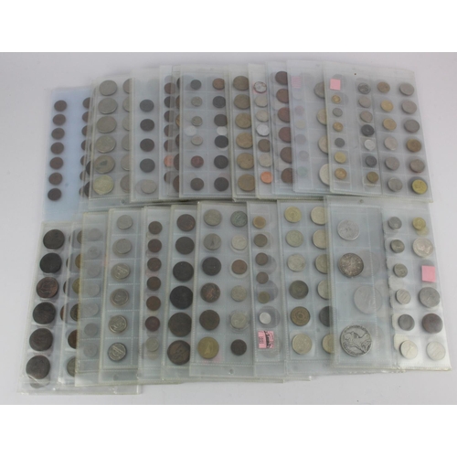 603 - World Coins approx. 6.5KG in album sleeves, silver noted.