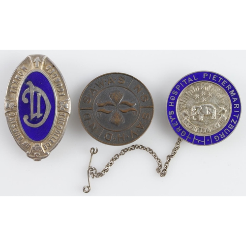 658 - Nursing badges - South African pin bade No: 21 593. Plus two silver marked and enamelled - College o... 