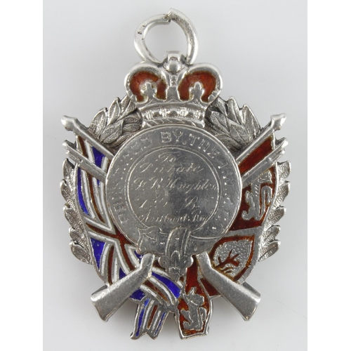 662 - Shooting silver & enamel medal reads on the front 