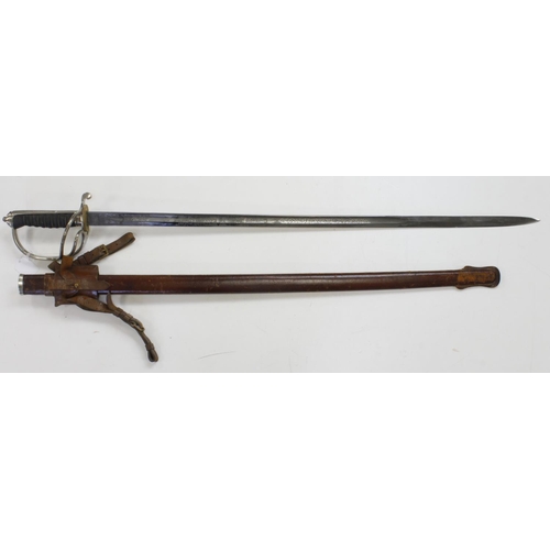 743 - GRV artillery officers sword in its leather field scabbard.