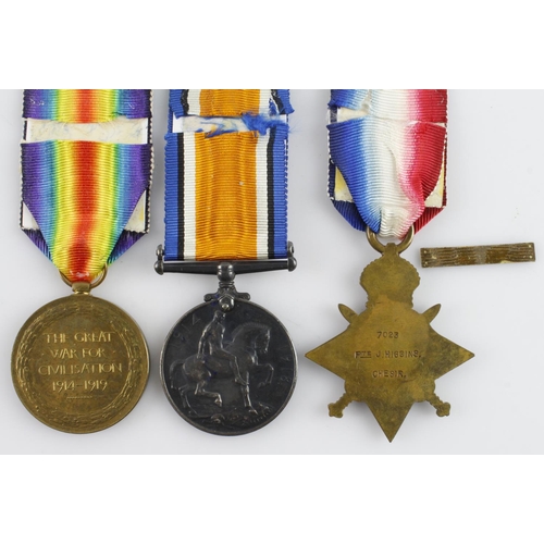 825 - 1914 Star and bar Aug-Nov trio named (7023 Pte J Higgins Ches R), taken Prisoner of War at Mons on t... 