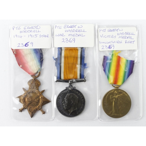 839 - 1915 Star Trio named (2369 Pte E W Haddrell Linc R)  (3)